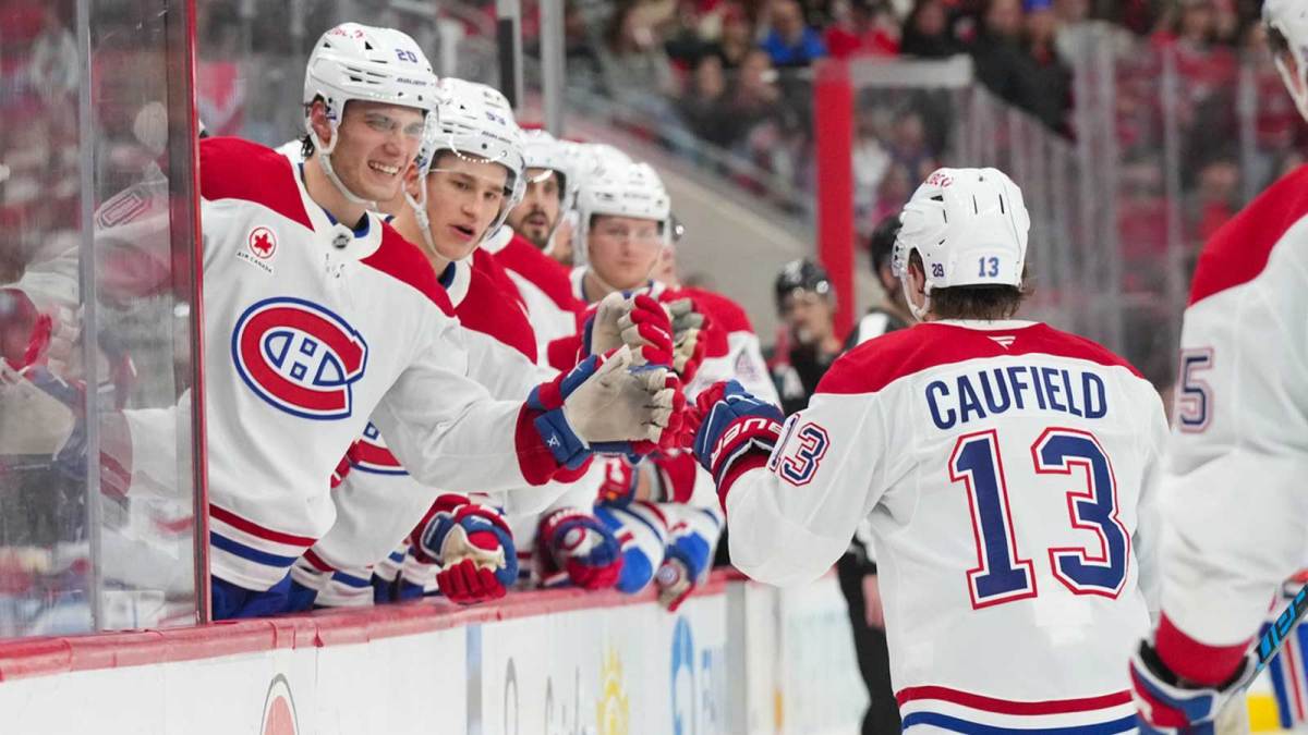 Montréal Canadiens right wing Cole Caufield (13) celebrates his goal against the Carolina Hurricanes during the second period at Lenovo Center.