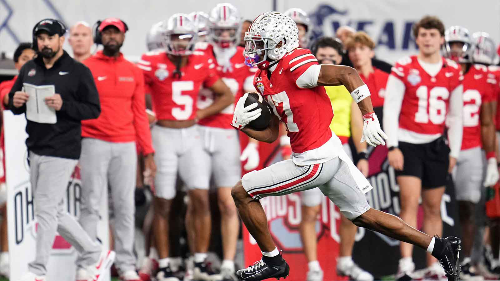 Ohio State Buckeyes wide receiver Carnell Tate (17) runs after a catch during the Cotton Bowl at AT&T Stadium in Arlington, Texas for the College Football Playoff quarterfinal game against the Miami Hurricanes on Dec. 31, 2025. Ohio State lost 24-14.