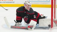Carolina Hurricanes goaltender Brandon Bussi (32) makes a pad save against the Buffalo Sabres during the second period at Lenovo Center.