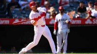Los Angeles Angels first baseman Carter Kieboom (17) hits a single during the ninth inning against the Houston Astros at Angel Stadium