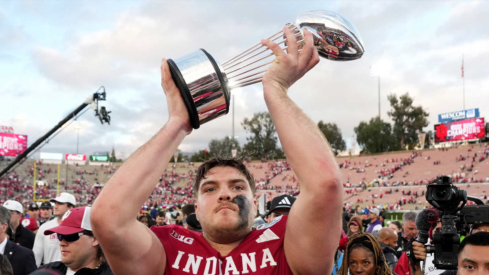 Indiana Hoosiers offensive lineman Carter Smith (65) celebrates with the trophy after defeating the Alabama Crimson Tide in the 2026 Rose Bowl and quarterfinal game of the College Football Playoff at Rose Bowl Stadium.