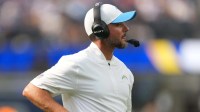 Los Angeles Chargers defensive coordinator Jesse Minter watches from the sidelines against the Los Angeles Rams in the first half at SoFi Stadium.