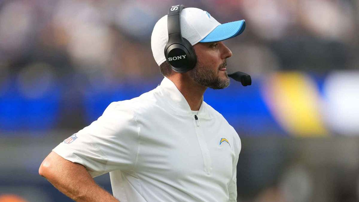 Los Angeles Chargers defensive coordinator Jesse Minter watches from the sidelines against the Los Angeles Rams in the first half at SoFi Stadium.