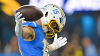Los Angeles Chargers wide receiver Ladd McConkey (15) celebrates after scoring a touchdown against the Pittsburgh Steelers during the second quarter of the game at SoFi Stadium.