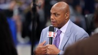 Charles Barkley talks on set before game three of the 2024 NBA Finals between the Boston Celtics and the Dallas Mavericks at American Airlines Center with Michael Jordan in the background