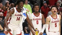 Alabama center Charles Bediako (14) reacts to a basket by substitute Alabama guard Delaney Heard (12) at Legacy Arena during the second round of the NCAA Tournament. Alabama advanced to the Sweet Sixteen with a 73-51 win over Maryland. Mandatory Credit: Gary Cosby Jr.-Tuscaloosa News Ncaa Basketball March Madness Alabama Vs Maryland
