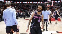 Jan 14, 2026; Chicago, Illinois, USA; Chicago Bulls guard Coby White (0) celebrates teams win against the Utah Jazz at United Center. Mandatory Credit: Kamil Krzaczynski-Imagn Images