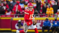 Kansas City Chiefs quarterback Patrick Mahomes (15) runs the ball during the second half against the Los Angeles Chargers at GEHA Field at Arrowhead Stadium.