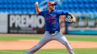 New York Mets pitcher Chris Devenski (49) pitches during a spring training workout at Clover Park.