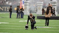 New Orleans Saints quarterback Spencer Rattler (2) kneels on the field prior to a game against the Tampa Bay Buccaneers at Caesars Superdome.