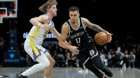 Brooklyn Nets forward Michael Porter Jr. (17) drives to the basket against Golden State Warriors guard Brandin Podziemski (2) during the third quarter at Barclays Center.