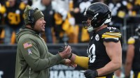 Pittsburgh Steelers linebacker Alex Highsmith (left) greets outside linebacker T.J. Watt (90) after a defensive stop against the Cincinnati Bengals during the third quarter at Acrisure Stadium.