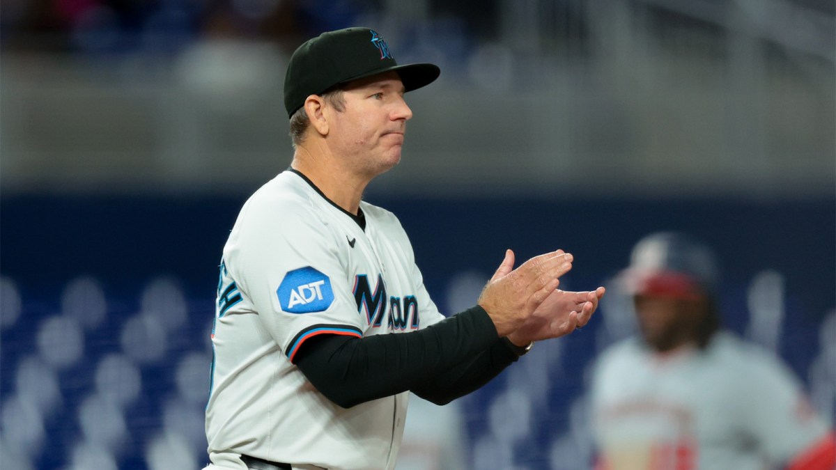 Miami Marlins manager Clayton McCullough (86) walks toward the mound for a pitching change against the Washington Nationals during the fifth inning at loanDepot Park.