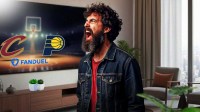 Somebody yelling at a TV with the logos the Cavs, the Pacers, and FanDuel on the screen.