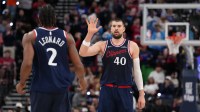 Clippers center Ivica Zubac (40) celebrates with forward Kawhi Leonard (2) against the Golden State Warriors in the second half at Intuit Dome