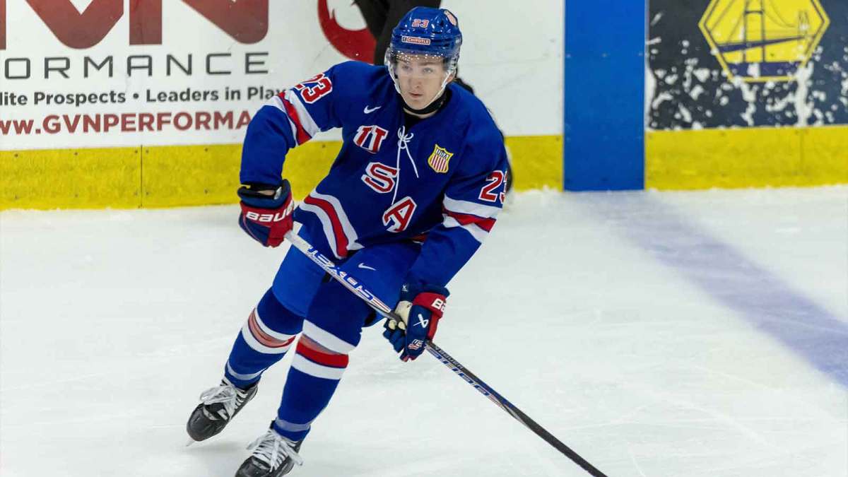 USA’s defenceman Cole Hutson (23) controls the puck against Canada during the first period of the 2024 World Junior Summer Showcase at USA Hockey Arena.