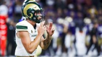 Colorado State Rams quarterback Brayden Fowler-Nicolosi (16) reacts after throwing a touchdown pass against the Washington Huskies during the third quarter at Husky Stadium.