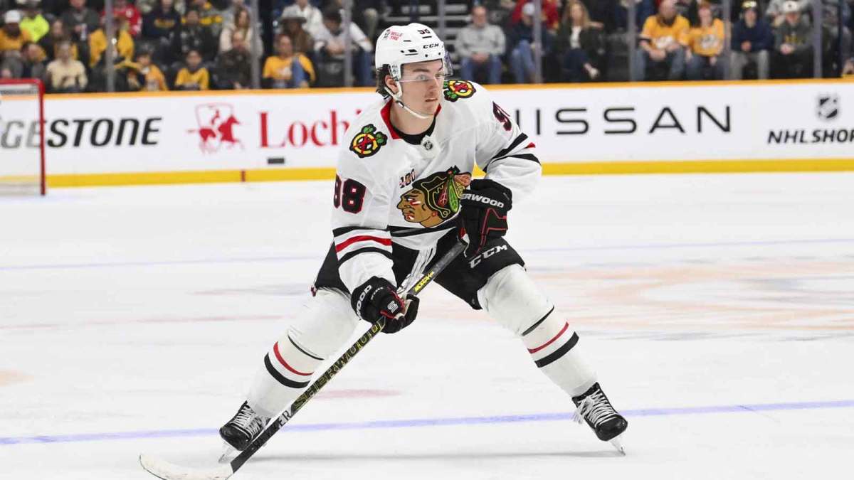 Chicago Blackhawks center Connor Bedard (98) skates with the puck against the Nashville Predators during the second period at Bridgestone Arena.