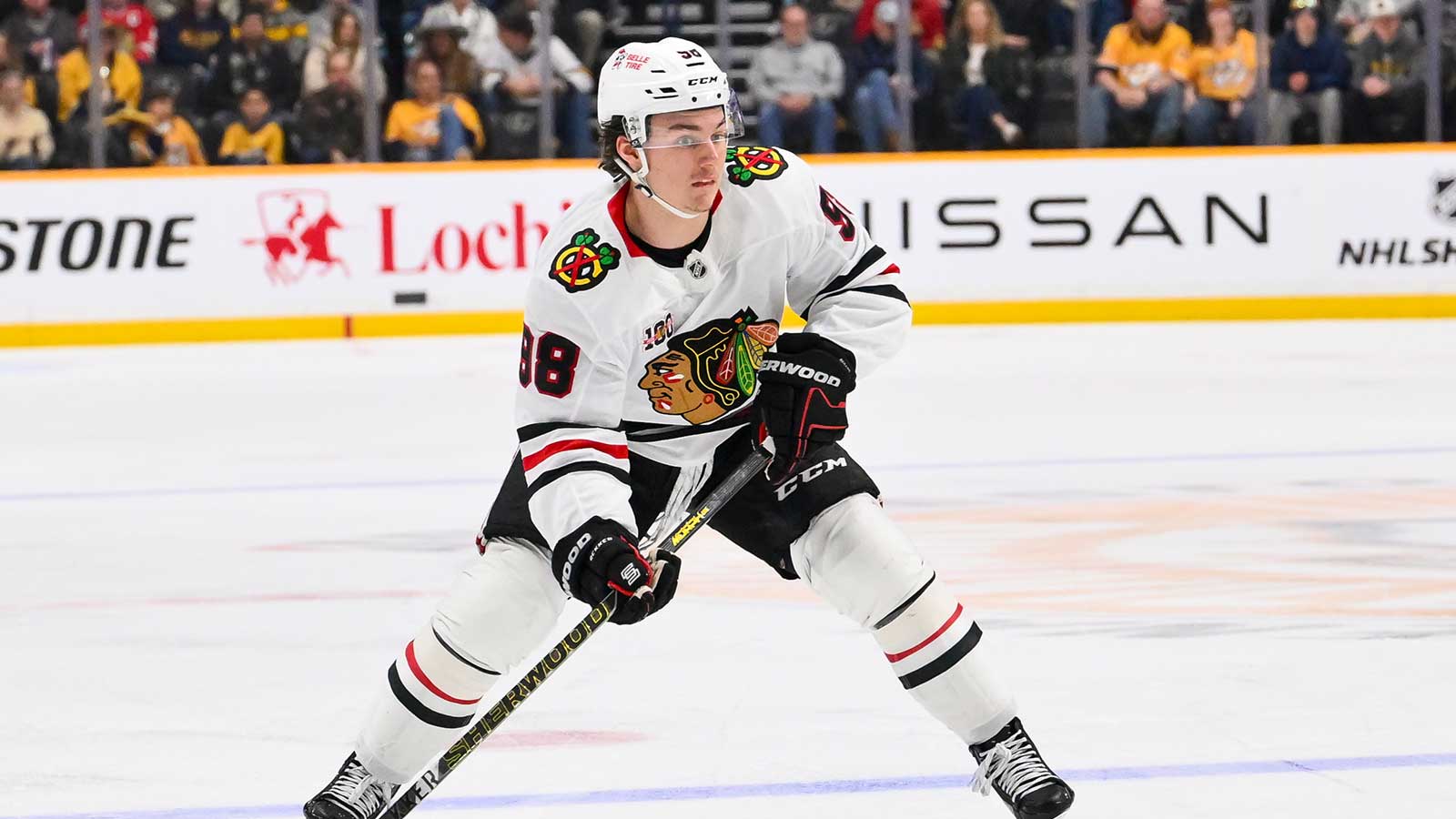 Chicago Blackhawks center Connor Bedard (98) skates with the puck against the Nashville Predators during the second period at Bridgestone Arena.