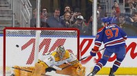 Edmonton Oilers forward Connor McDavid (97) scores on a penalty shot against Nashville Predators goaltender Juuse Saros (74) during the second period at Rogers Place.