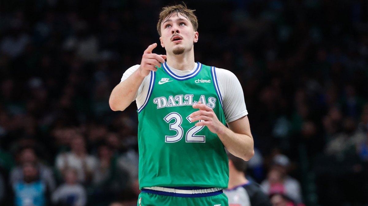 Dallas Mavericks forward Cooper Flagg (32) reacts during the second half against the Charlotte Hornets at American Airlines Center.
