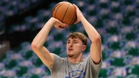 Dallas Mavericks forward Cooper Flagg (32) warms up before the game against the Charlotte Hornets at American Airlines Center.