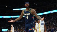 Denver Nuggets center DeMarcus Cousins (4) reacts to a foul in the second quarter against the Golden State Warriors of the first round for the 2022 NBA playoffs at Ball Arena