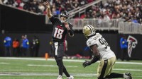 Atlanta Falcons quarterback Kirk Cousins (18) throws a pass during the game against the New Orleans Saints during the second half at Mercedes-Benz Stadium.
