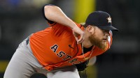 Houston Astros relief pitcher Craig Kimbrel (46) pitches against the Texas Rangers during the eighth inning at Globe Life Field.
