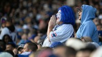 Chicago Cubs fans cheer in the sixth inning during game three of the NLDS round between the Chicago Cubs and the Milwaukee Brewers for the 2025 MLB playoffs at Wrigley Field.