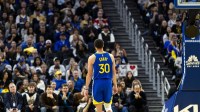Golden State Warriors guard Stephen Curry (30) walks down the court during the third quarter against the Utah Jazz at Chase Center.