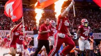 Indiana Hoosiers head coach Curt Cignetti takes the field with the team Friday, Jan. 9, 2026, during the Peach Bowl and semifinal game of the College Football Playoff against the Oregon Ducks at Mercedes-Benz Stadium in Atlanta.