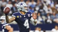 Dallas Cowboys quarterback Dak Prescott (4) passes against the Los Angeles Chargers during the first quarter at AT&T Stadium.