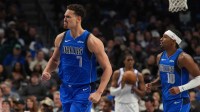 Dallas Mavericks forward Dwight Powell (7) reacts after a made basket against the Utah Jazz during the first half at American Airlines Center.