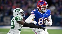 Buffalo Bills tight end Dalton Kincaid (86) makes a catch defended by New York Jets cornerback Samuel Womack III (39) during the first half at Highmark Stadium.