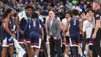 UConn Huskies head coach Dan Hurley reacts after a basket by guard Malachi Smith (0) during the first half against the Seton Hall Pirates at Prudential Center.