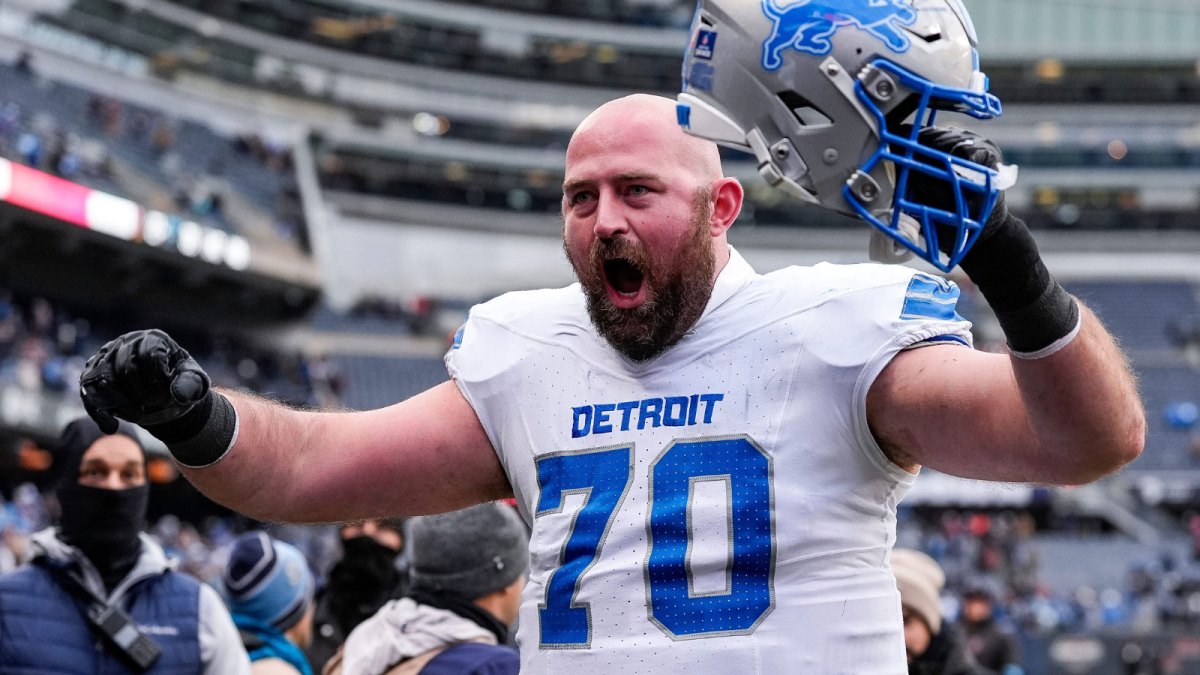 Detroit Lions offensive tackle Dan Skipper (70) celebrates 34-17 win over Chicago Bears as he exits the field at Soldier Field in Chicago, Ill.