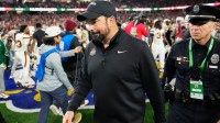 Ohio State Buckeyes head coach Ryan Day leaves the field following the Cotton Bowl at AT&T Stadium in Arlington, Texas for the College Football Playoff quarterfinal game against the Miami Hurricanes on Dec. 31, 2025. Ohio State lost 24-14.