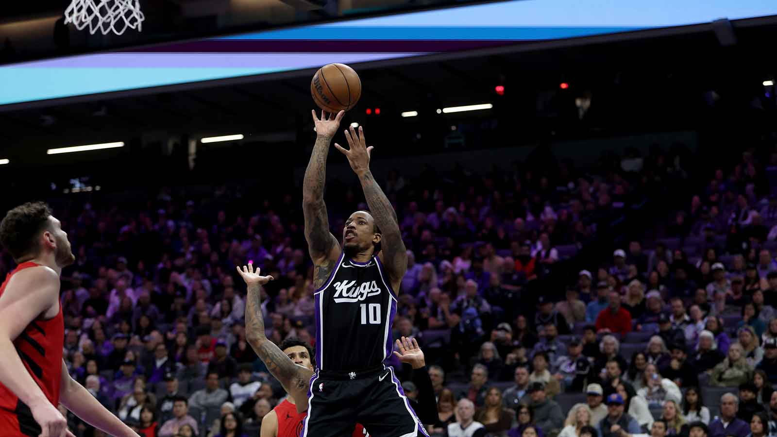 Sacramento Kings forward DeMar DeRozan (10) shoots against the Portland Trail Blazers during the fourth quarter at Golden 1 Center.