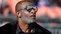 Legendary football and baseball player and father of Cleveland Browns quarterback Shedeur Sanders, Deion Sanders on the sidelines prior to a game against the Buffalo Bills at Huntington Bank Field.