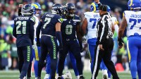 Seattle Seahawks defensive end DeMarcus Lawrence (0) reacts after a play against the Los Angeles Rams during the first half in the 2026 NFC Championship Game at Lumen Field.