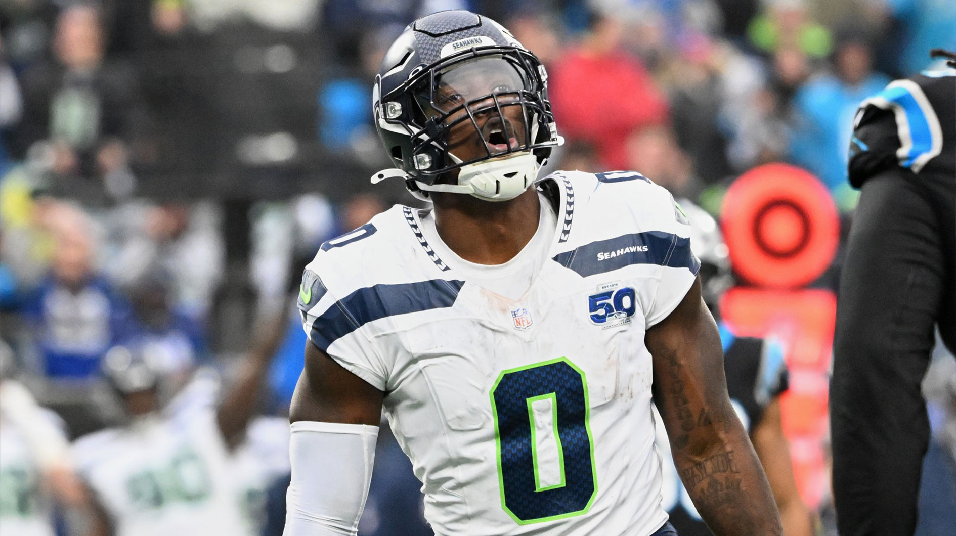 Seattle Seahawks defensive end DeMarcus Lawrence (0) reacts against the Carolina Panthers during the fourth quarter at Bank of America Stadium.