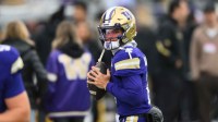 Washington Huskies quarterback Demond Williams Jr. (2) during warmup before the game against the Oregon Ducks at Husky Stadium.