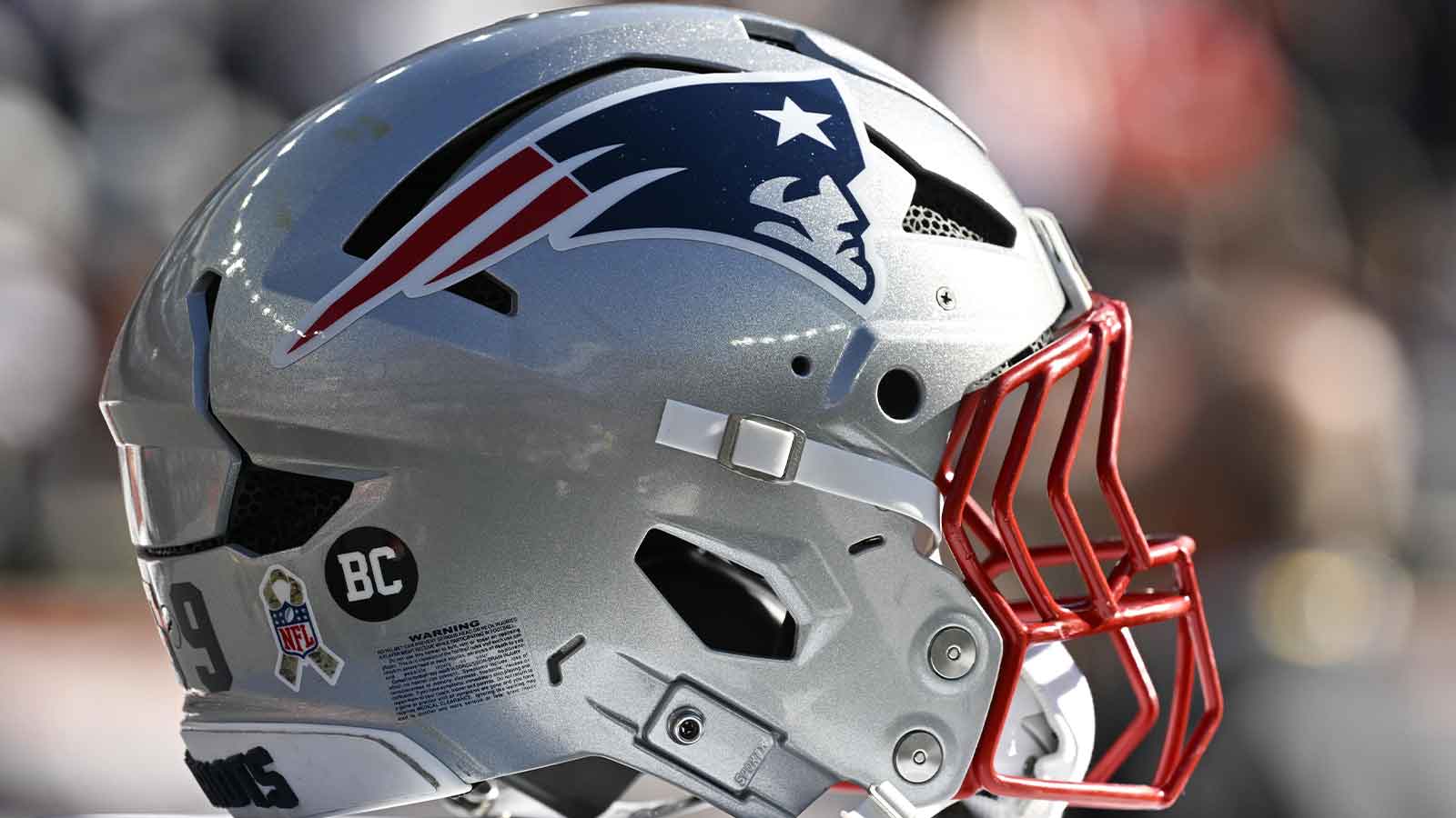 https://wp.clutchpoints.com/wp-content/uploads/2026/01/Detail-view-of-a-New-England-Patriots-helmet.jpg