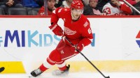 Detroit Red Wings defenseman Ben Chiarot (8) skates with the puck in the second period against the Ottawa Senators at Little Caesars Arena.