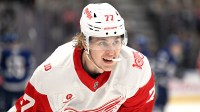 Detroit Red Wings defenseman Simon Edvinsson (77) waits for play to resume after a time out against the Toronto Maple Leafs in the third period at Scotiabank Arena.