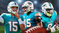 Dolphins 2026 NFL mock draft per the PFF simulator featuring Keldric Faulk (Auburn), Ty Simpson (Alabama), and Michael Trigg (Baylor) all in Dolphins jerseys