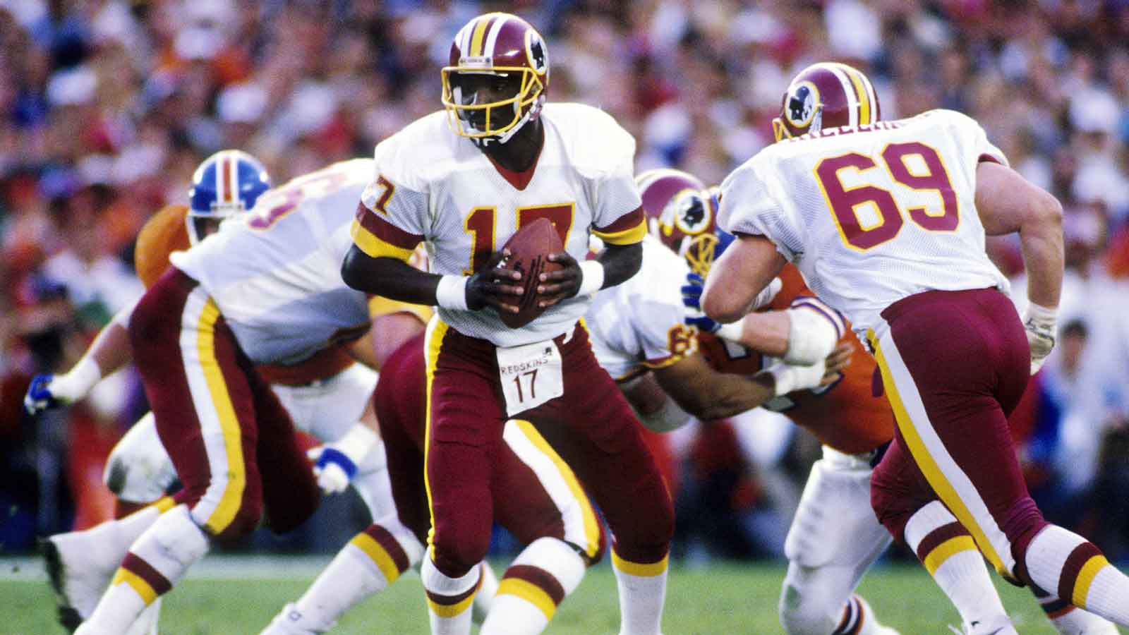 FILE PHOTO; Washington Redskins quarterback Doug Williams (17) in action against the Denver Broncos during Super Bowl XXII at Jack Murphy Stadium. Washington defeated Denver 42-10. 