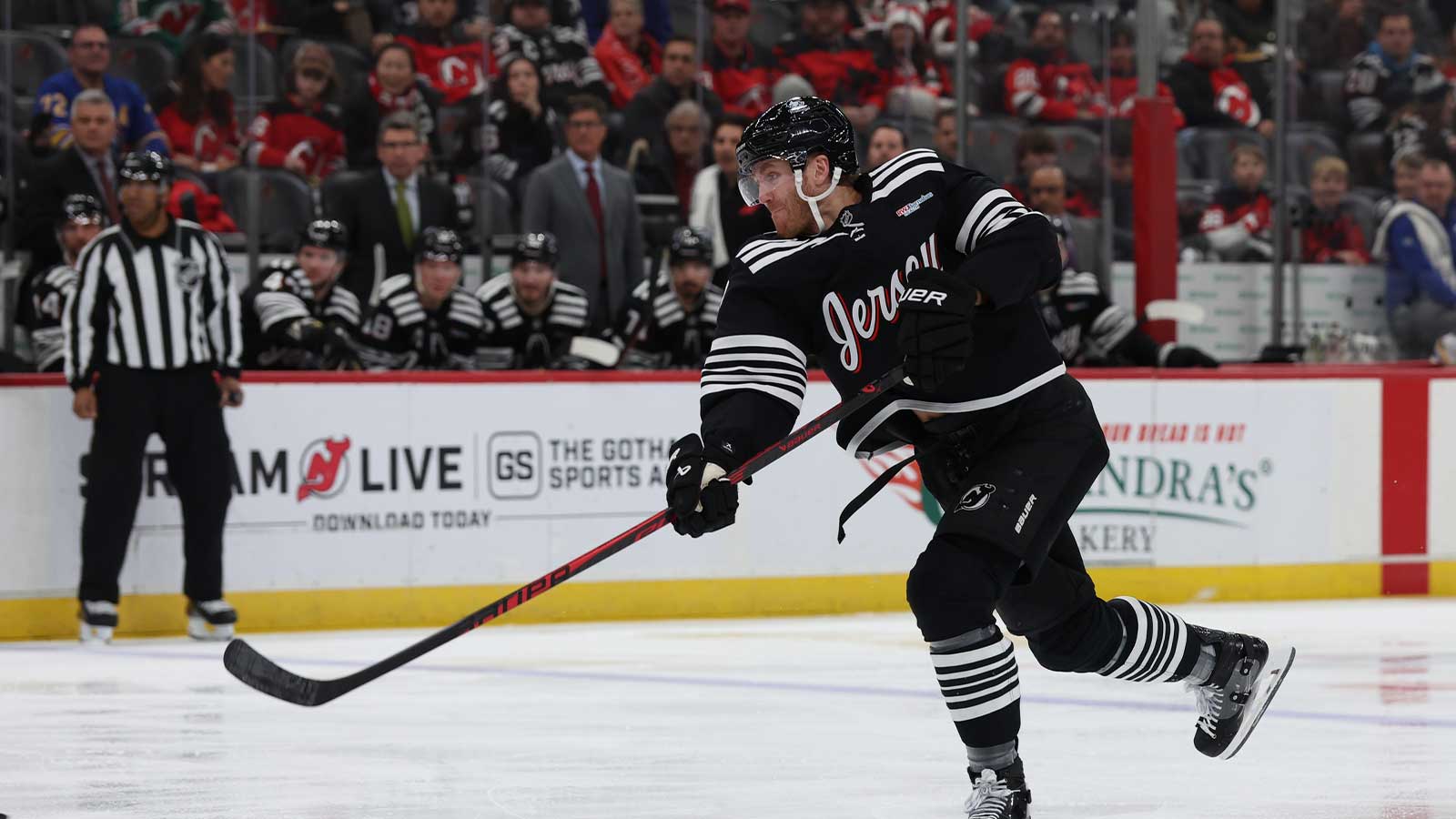 New Jersey Devils defenseman Dougie Hamilton (7) takes a shot against the Buffalo Sabres during the second period at Prudential Center.