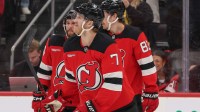 New Jersey Devils defenseman Dougie Hamilton (7) celebrates his goal against the Utah Mammoth during the second period at Prudential Center.